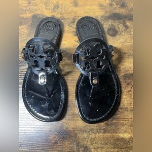 Tory Burch Black Patented Leather Logo Thong Sandals with Gold Accent